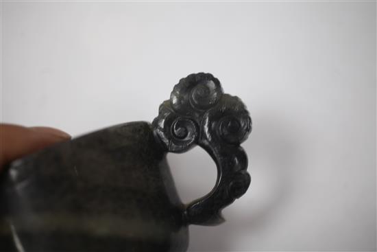A Chinese grey and black speckled jade two handled cup, 17th/18th century, width 13.3cm